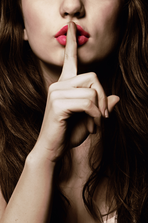 sexy woman keeping secret