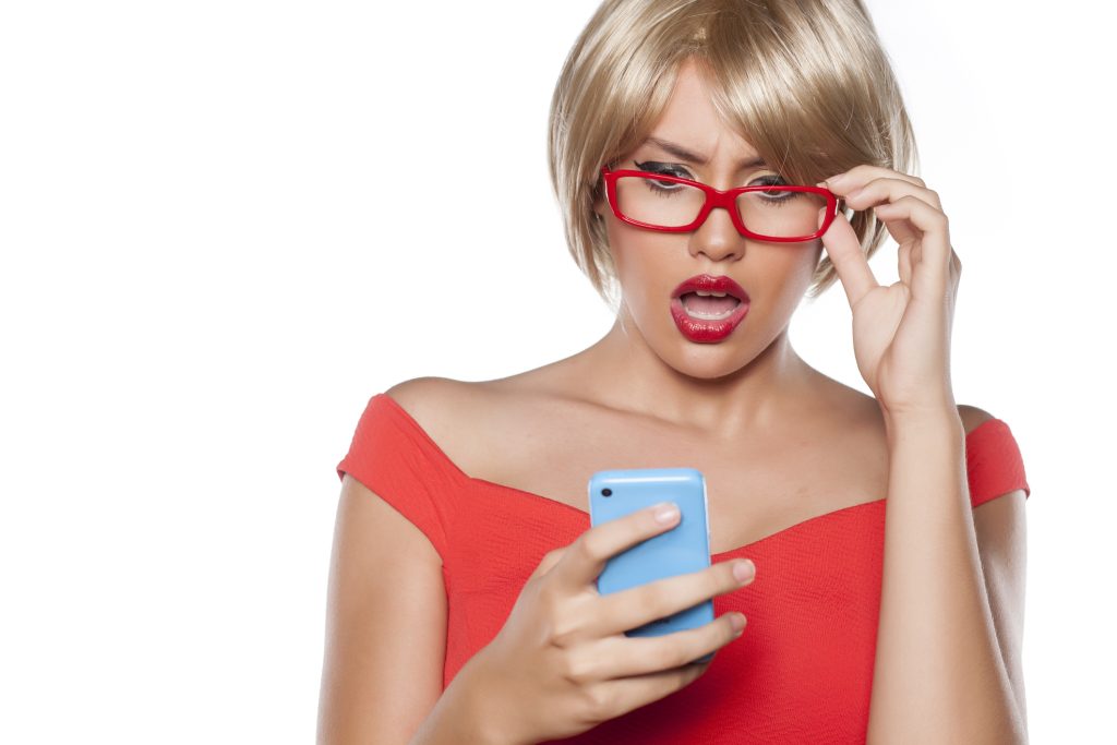 woman surprised by awkward text message